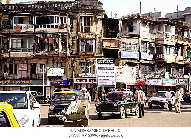 Rani building chawl mass urban housing and festival dahi hundi govinda janmashtami hording ; Charni road ; Bombay Mumbai ; Maharashtra ; India