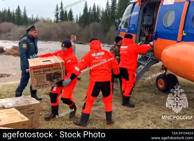 RUSSIA, IRKUTSK REGION - MAY 15, 2023: Rescuers deliver humanitarian aid to flood victims in Katangsky District, those of them in need of social and medical...