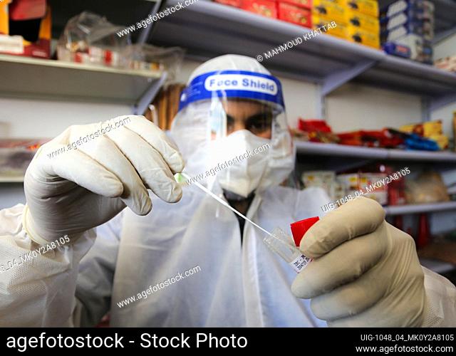 A Palestinian medic from the Infection Control Committee, taking random samples from Coronavirus COVID-19 in Gaza Strip