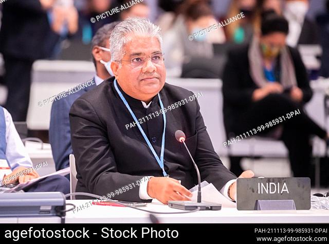 13 November 2021, United Kingdom, Glasgow: Bhupender Yadav, Environment Minister of India, speaks at the UN Climate Change Conference COP26 before the opening...