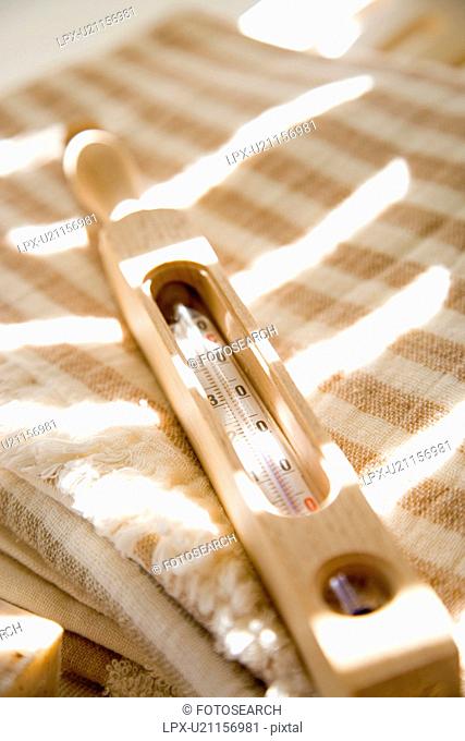 Organic cotton towels and a thermometer