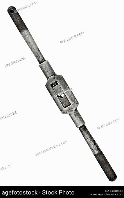 vintage tap wrench isolated over white background, clipping path
