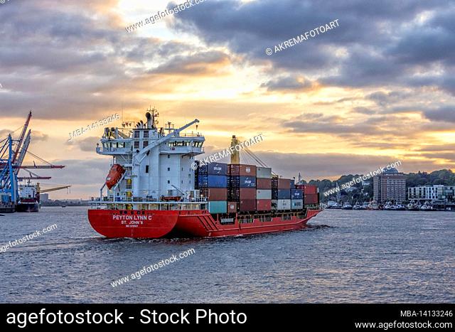 view of the hamburg harbor and the elbe in the evening