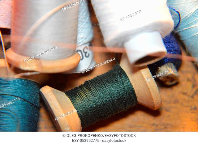 Spools of thread for sewing clothes close-up
