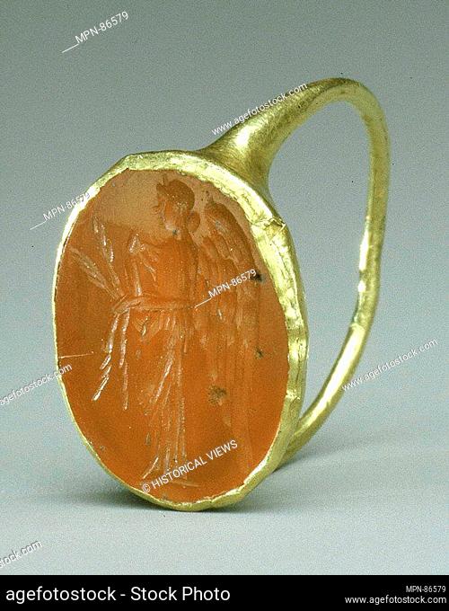 Gold ring with carnelian intaglio: winged Nemesis. Period: Imperial; Date: 1st-early 3rd century A.D; Culture: Roman, Cypriot; Medium: Carnelian