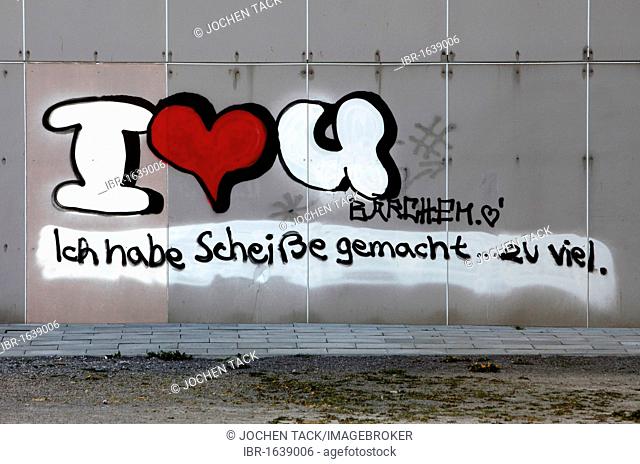 Graffiti on a building, written apology in German for a mistake made in a love relationship