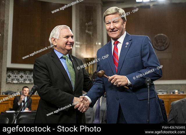 United States House Armed Services Chairman Mike Rogers (Republican of Alabama), right, receives the gavel from US Senate Armed Services Chairman Jack Reed...