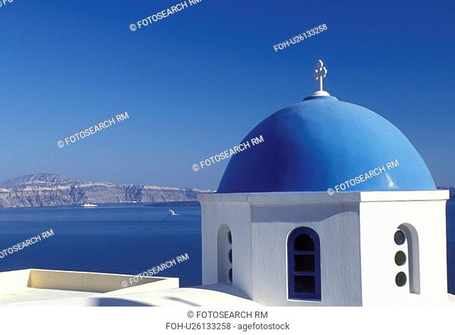 church, Santorini, Greek Islands, Oia, Cyclades, Greece, Europe, Whitewashed church with blue dome in the village of Oia overlooking the Aegean Sea on the...