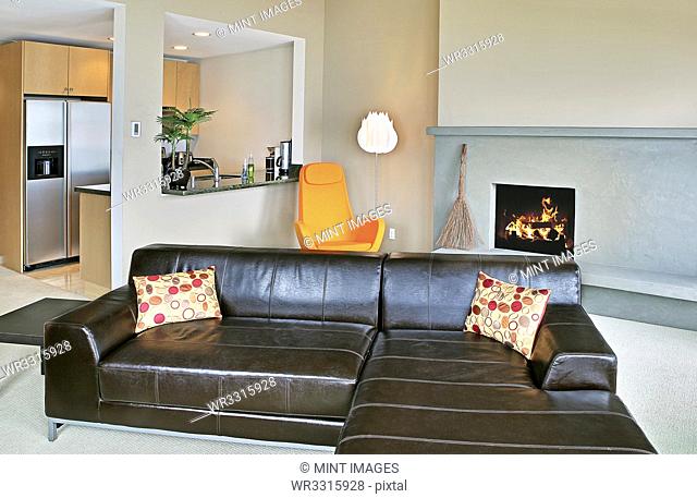 Sectional sofa and kitchen in modern home