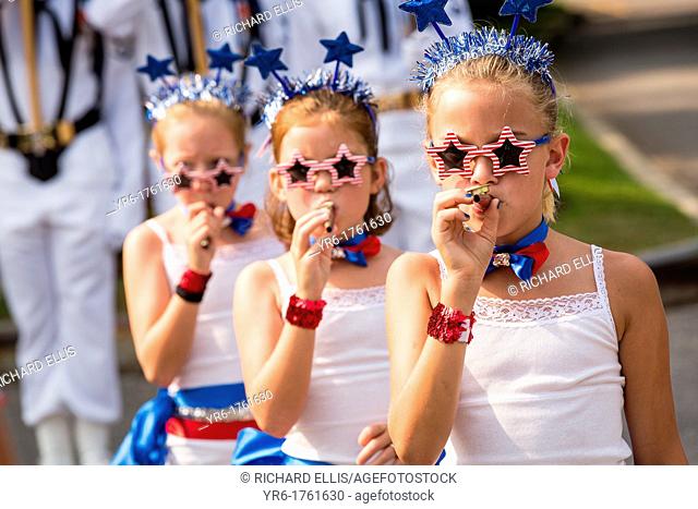 Young members of Uncle Sam's Band play their kazoo's during the annual I'On Community Independence Day Parade on July 4, 2012 in Mt Pleasant, South Carolina