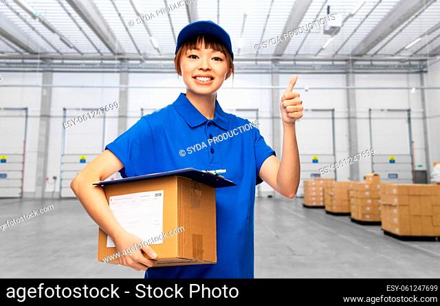 delivery woman with parcel shows thumbs up