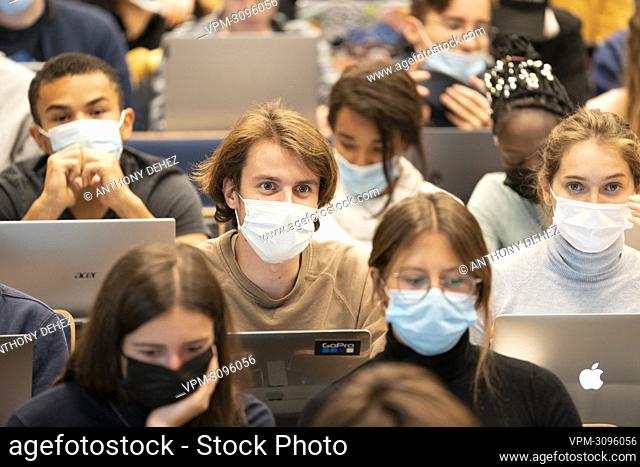 Students wear face masks as they attend the inaugural lesson of the political science course at UCLouvain, in Louvain-la-Neuve, Wednesday 22 September 2021