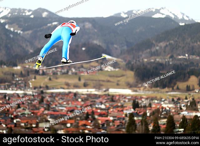 04 March 2021, Bavaria, Oberstdorf: Nordic skiing: World Cup, combined, individual, large hill/10 km, men, jump. Jarl Magnus Riiber from Norway in action