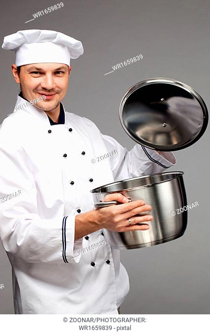 Chef cooking with pot