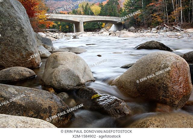 Bridge during the autumn months, which crosses the East Branch of the Pemigewasset River along the Kancamagus Scenic Byway Route 112 in Lincoln