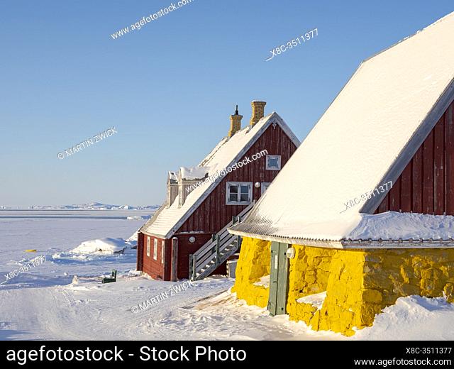Museum located in buildings dating back to the founding of the colony. Winter in the town of Upernavik in the north of Greenland at the shore of Baffin Bay