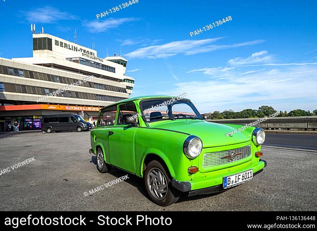 03.10.2020, Berlin, a bright green Trabant 601 Universal (station wagon) on the 30th day of German reunification at Berlin-Tegel Otto Lilienthal TXL airport in...