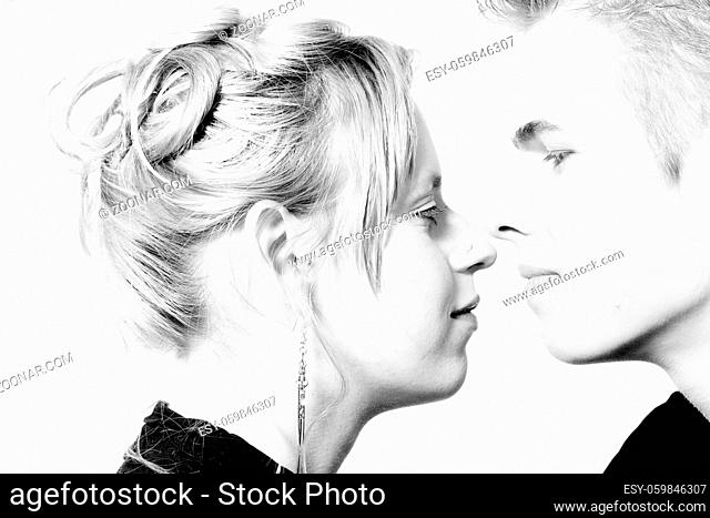 Couple of teenagers in the studio on a white background