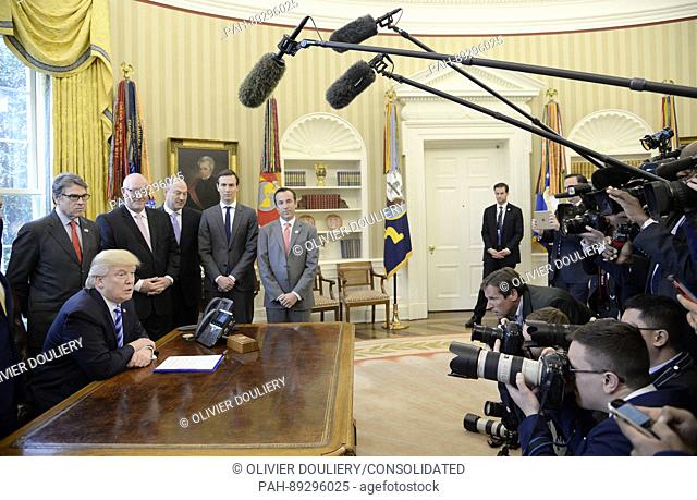 United States President Donald Trump speaks during a National Economic Council meeting where he signed what he described as a ""permit"" for the construction of...