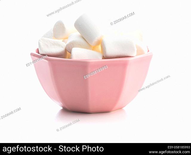 White sweet marshmallows candy in bowl isolated on white background