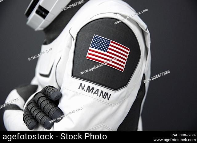 A SpaceX launch and entry suit bears an American flag, and the name of NASA Astronaut Nicole Mann, who will serve as the commander of NASA's SpaceX Crew-5...