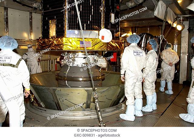 06/19/2002 -- On the tower at Launch Complex 17-A, Cape Canaveral Air Force Station, workers look over the Comet Nucleus Tour CONTOUR spacecraft before removing...