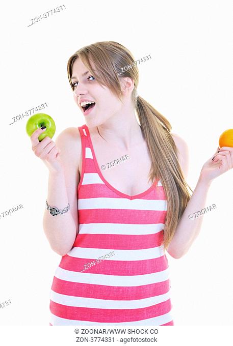 woman eat green apple isolated on white backround in studio representing healthy lifestile and eco food concept