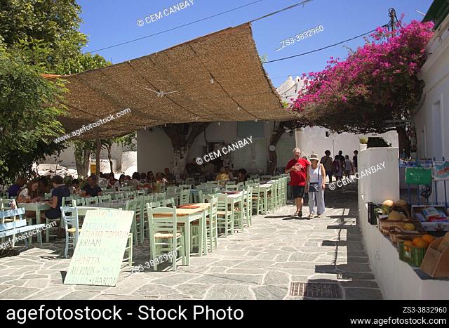 People at an open-air restaurant at the old town Hora-Chora, Folegandros Island, Cyclades Islands, Greek Islands, Greece, Europe