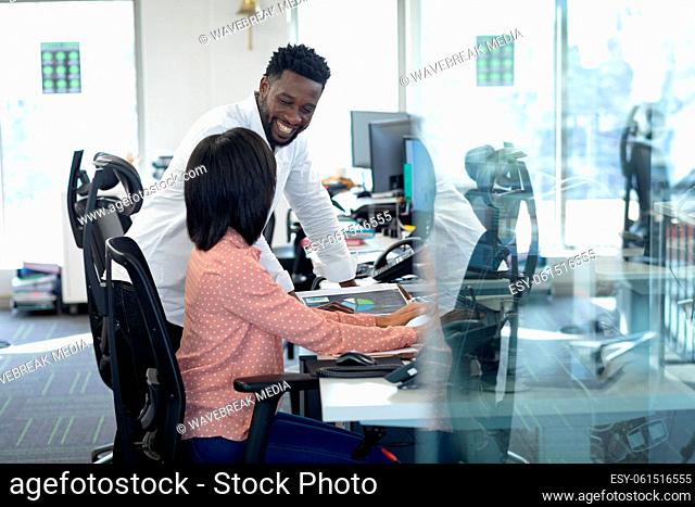 Businessman and businesswomen working together at modern office