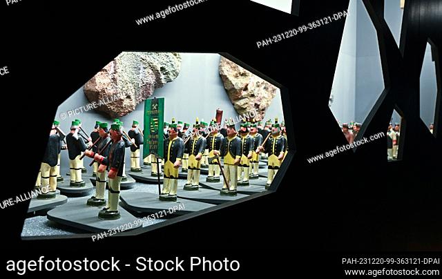20 December 2023, Saxony, Drebach: A mountain parade is presented in the new mining labyrinth at Scharfenstein Castle. The parade can be set in motion by...