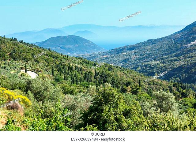 Misty summer coast panorama (Greece, Lefkada). View from up