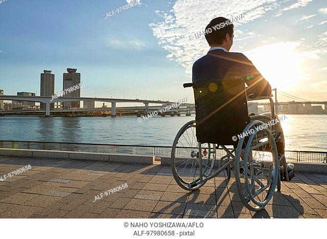 Japanese young man on wheelchair