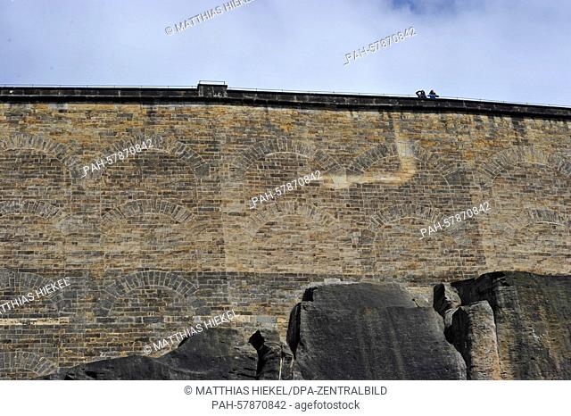 Tourists stand on the copings on fortress Friedrichsburg in Koenigstein, Germany, 22 April 2015. A new permanent exhibtion will open on 01 May 2015 on the...