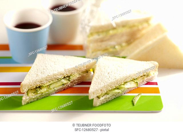 English cucumber sandwiches with dill, mustard, cream cheese on toasted bread