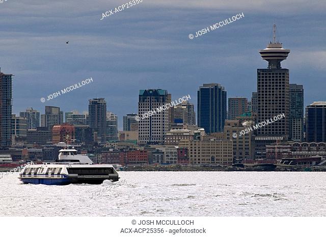 A Seabus crosses the Vancouver harbour towards downtown Vancouver