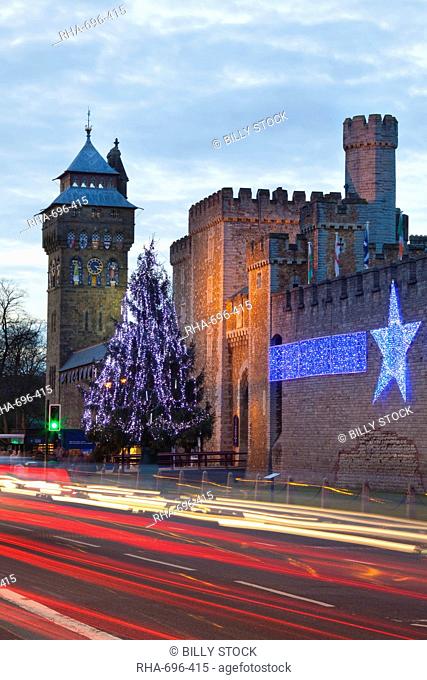 Cardiff Castle with Christmas lights and traffic light trails, Cardiff, South Wales, Wales, United Kingdom, Europe