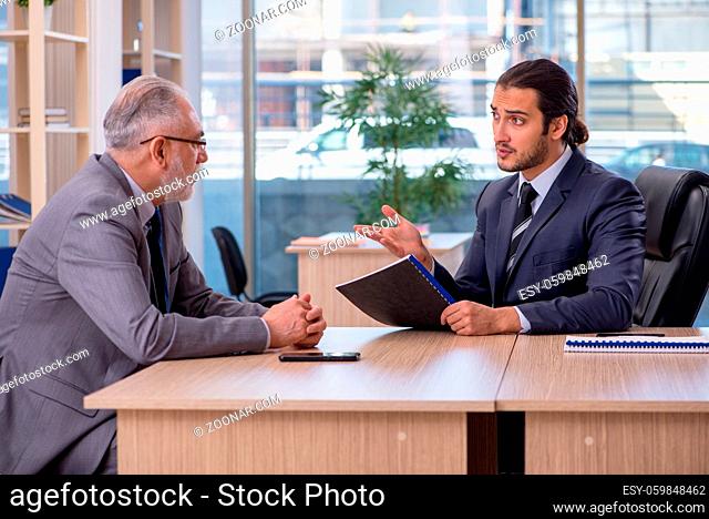 Two businessman discussing business startup project