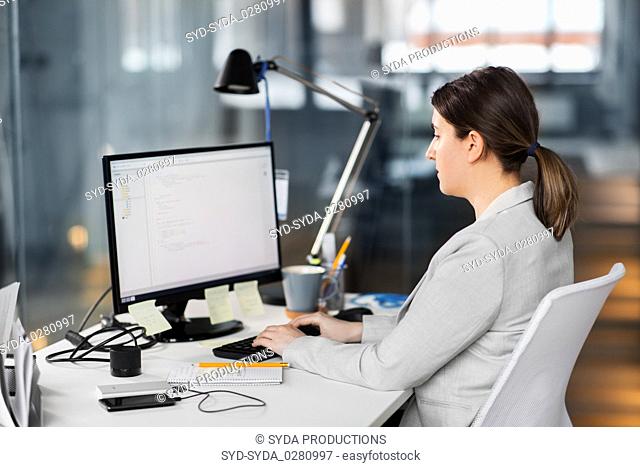 businesswoman with computer working at office