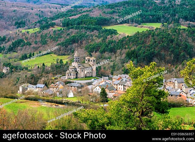 Landscape in Auvergne region with Saint-Nectaire Church, France