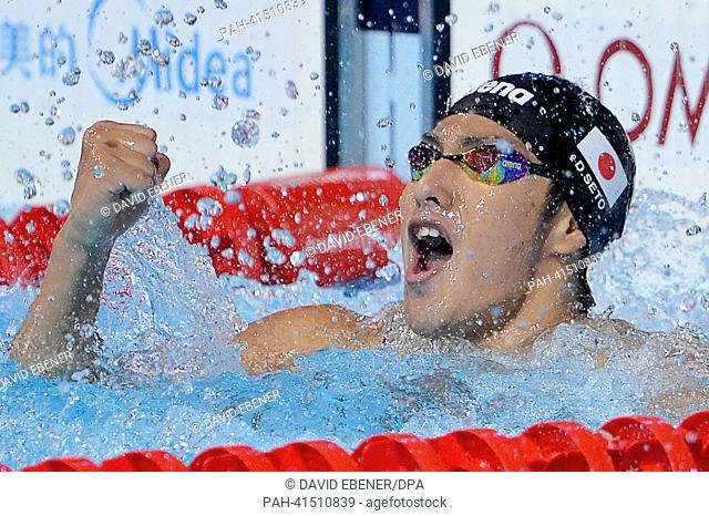 Dalya Seto of Japan celebrates after winning the men's 400m Individual Medley final of the 15th FINA Swimming World Championships at Palau Sant Jordi Arena in...
