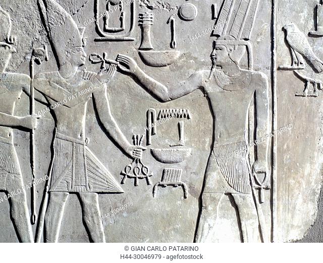 Luxor, Egypt, Karnak temple Reliefs and hieroglyphs on the column walls of the so called White Chapel of Sesostris I (Senousert or Senousret I) (1971-1926 b C )...