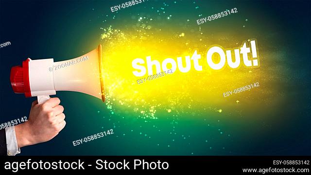 Young woman yelling to loudspeaker with Shout Out! inscription, modern media concept
