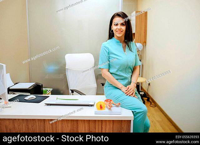 Female gynecologist sitting at the clinic office. Gynecological examination or consultation, gynecology office. Doctor in hospital