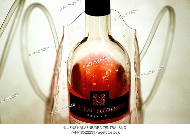 A bottle of Rose wine from Chateau Florentine stands in a transparent cooler bag during the Lebanese wine day at the Ritz-Carlton in Berlin, Germany