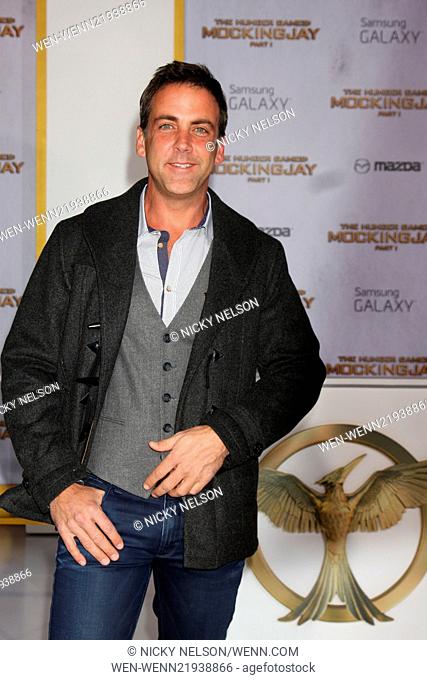The Hunger Games: Mockingjay Part 1 Premiere Featuring: Carlos Ponce Where: Los Angeles, California, United States When: 18 Nov 2014 Credit: Nicky Nelson/WENN