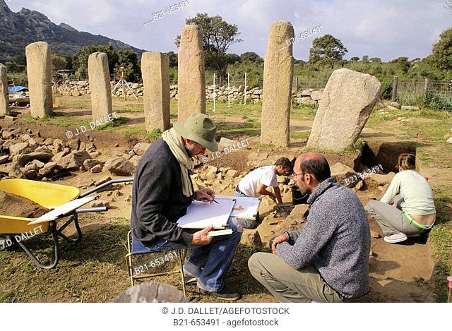 Working on the archeological site of  Stantari, at Cauria. Corsica. France