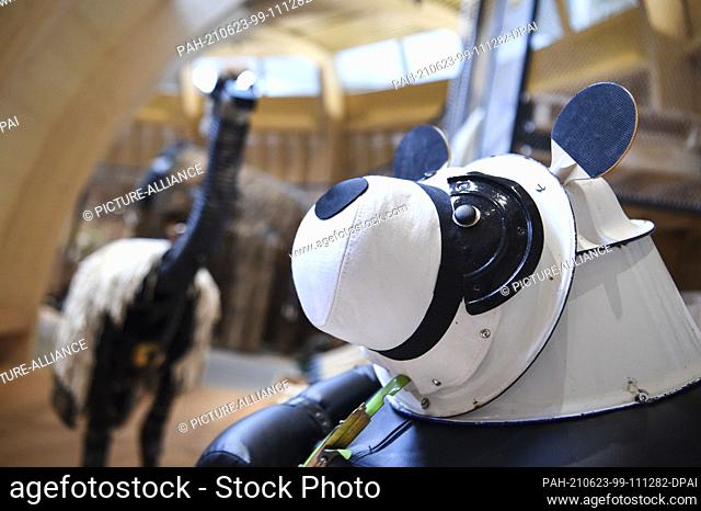 23 June 2021, Berlin: A panda bear figurine that was made from materials such as ping-pong paddles is on display at ANOHA