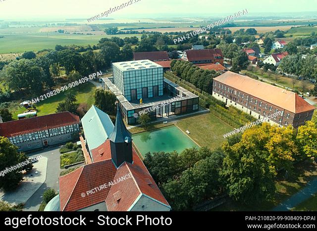 20 August 2021, Thuringia, Volkenroda: View of the Volkenroda Monastery with the Christus Pavillon (taken with a drone). This year marks the 20th anniversary of...