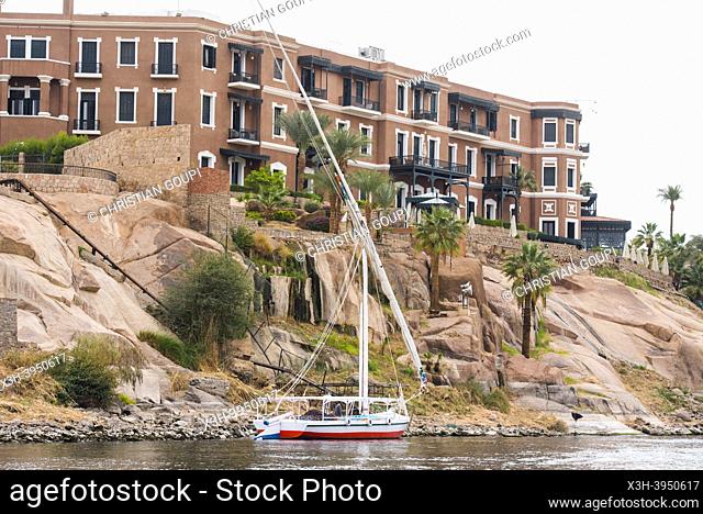 Felucca at the foot of the Sofitel Legend Old Cataract Hotel, Aswan, Egypt, Northeastern Africa