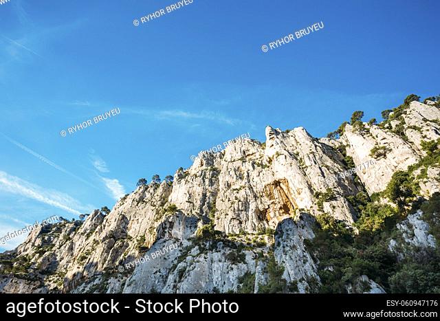 Nature Of Calanques On The Azure Coast Of France. High Cliffs Under Blue Sunny Sky. Copy Space